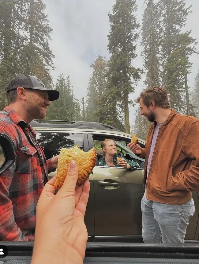 Friends sharing food outdoors