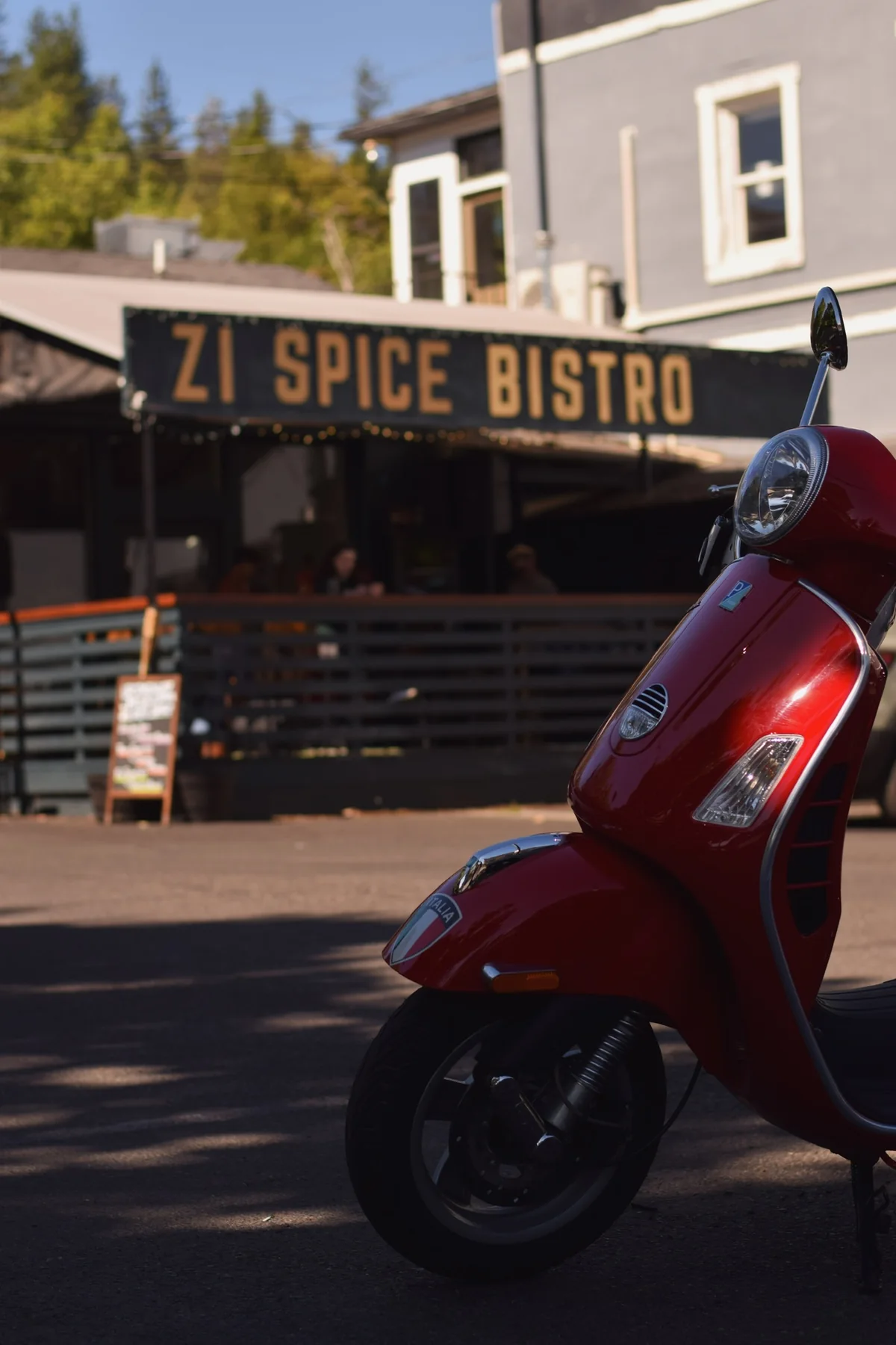 Restaurant exterior and scooter photographed by Alli Halliday